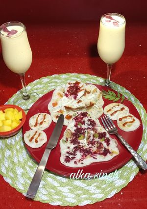 A picture of Uttappam(beet root &cheese).