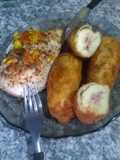Pechugas gratinadas y bastoncitos de jamón y queso