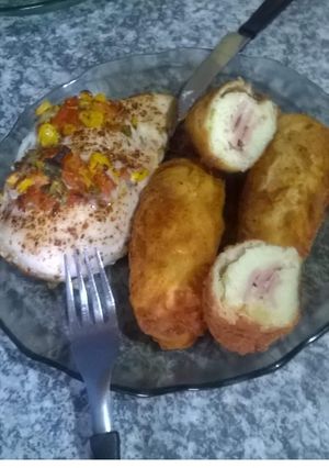 Una foto de Pechugas gratinadas y bastoncitos de jamón y queso