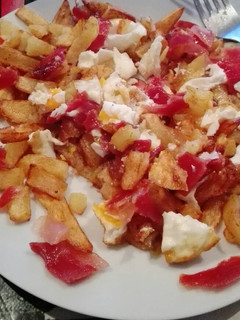 Una foto de Papas con jamón