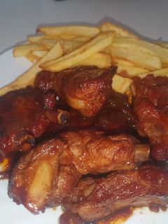 Una foto de Costillas con Coca-Cola