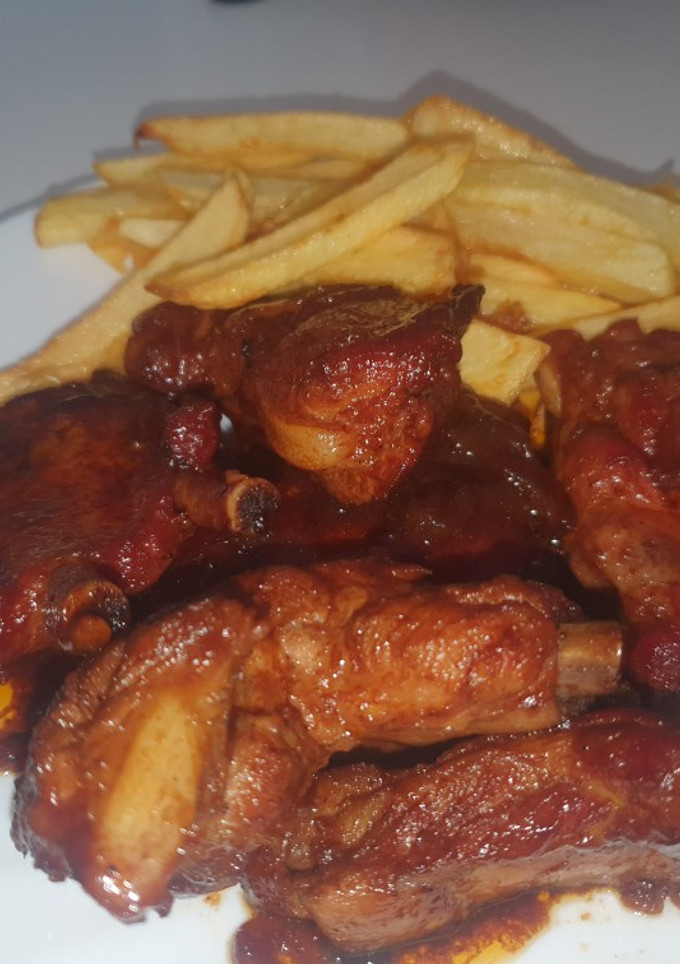 Una foto de Costillas con Coca-Cola