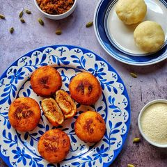 A picture of Sooji Manda Pitha.
