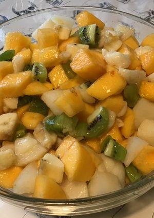 Une photo de Salade de fruits exotiques au jus d orange