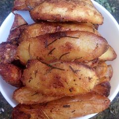 A picture of Rosemary potato wedges.