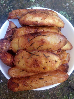 A picture of Rosemary potato wedges.