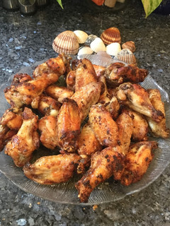 Una foto de Alitas de pollo fritas condimentadas