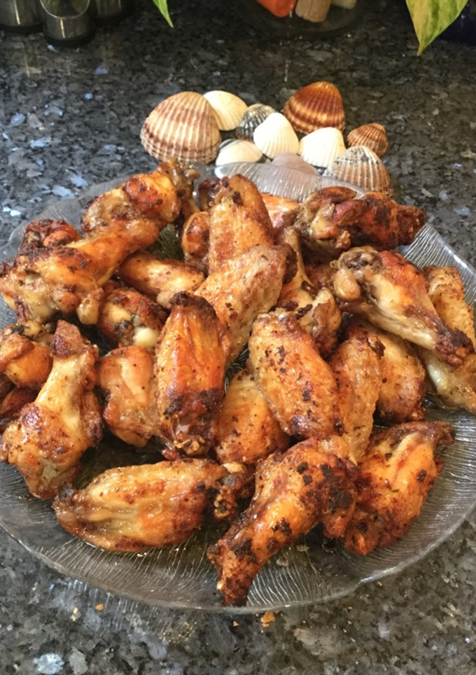 Una foto de Alitas de pollo fritas condimentadas
