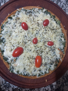 Una foto de Fainá Gratinada con Mozzarella y Espinaca