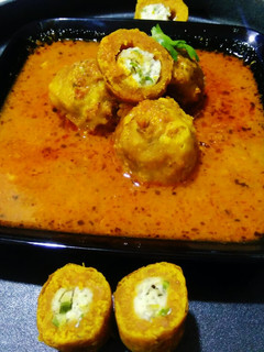 A picture of Paneer Stuffed Shahi Gatta Curry.