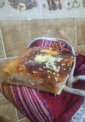 صورة لوصفة فطيرة بالجبن والطماطم