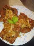 Bisteck encebollado
