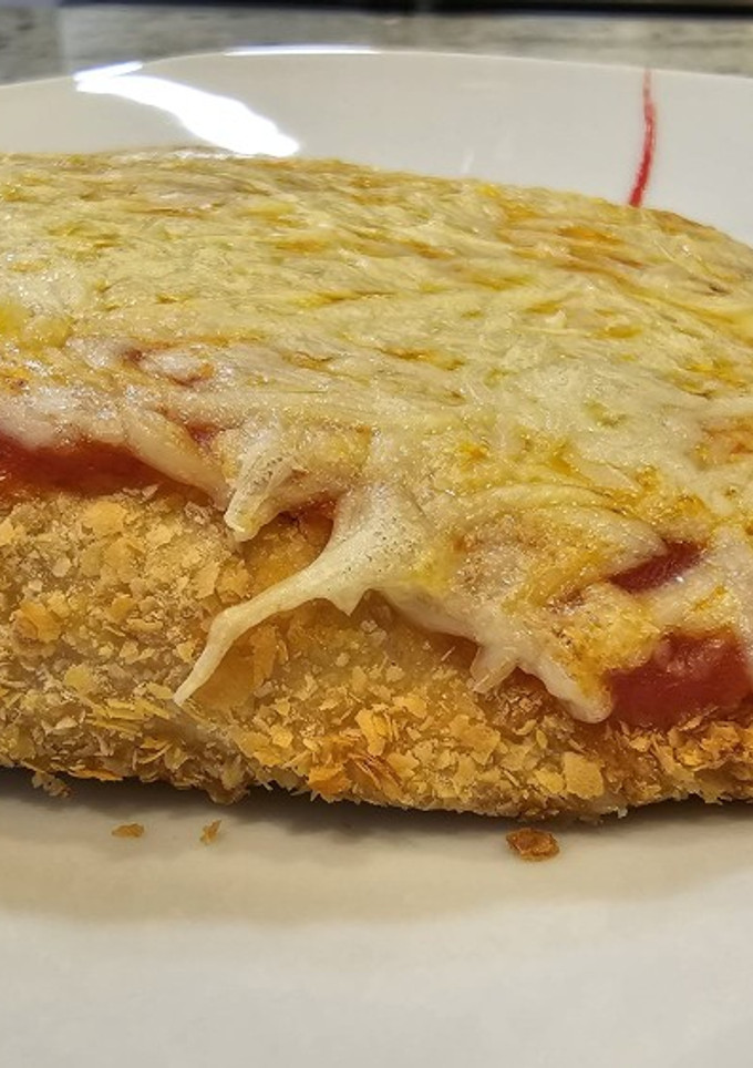 Una foto de Pollo a la napolitana con copos de patata