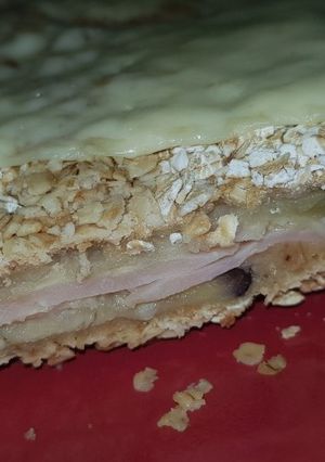 Una foto de Milanesas de berenjena rellena de jamón y queso