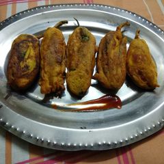 A picture of Chicken stuffed Chilli Pakoda.