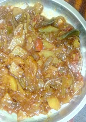 A picture of Onion potato tomato veg.
