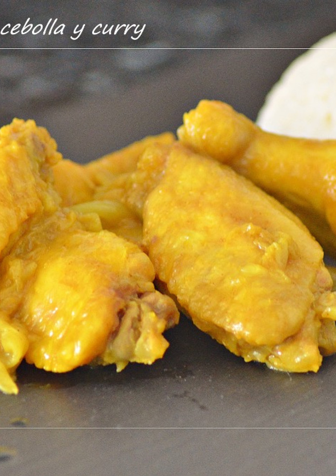 Una foto de Alitas de pollo con cebolleta y curry (Thermomix)