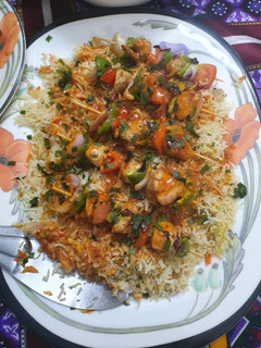 A picture of Three layered Shashlik rice platter.