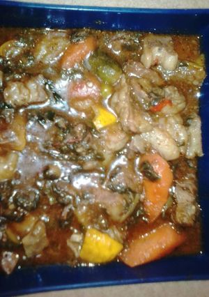 A picture of Lamb stew with spinach & mixed veg.