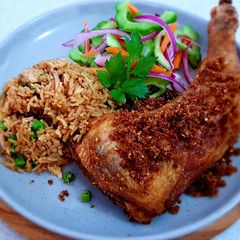 A picture of AYAM GORENG BUMBU KUNING (FRIED CHICKEN WITH SPICED).