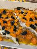Skate Wings with Baby Carrots and Black Garlic