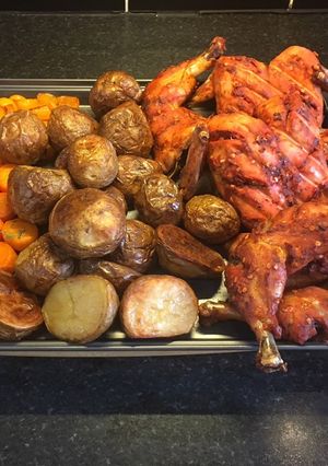 A picture of Whole Roasted Chicken With Potato and Carrots:.