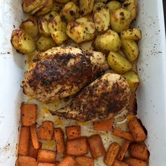 A picture of Sheet Pan Chicken with Potatoes and Carrots.