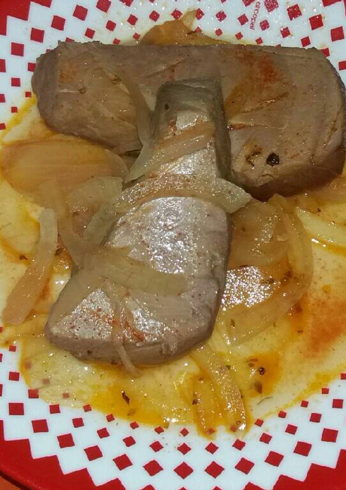 Una foto de Atún encebollado