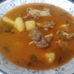 A picture of Aloo Gosht.