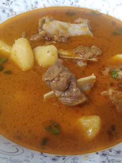 A picture of Aloo Gosht.