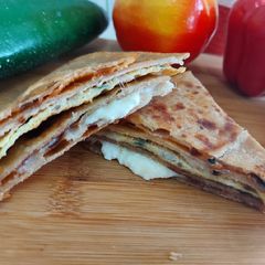 A picture of Cheesey omelette paratha wrap.