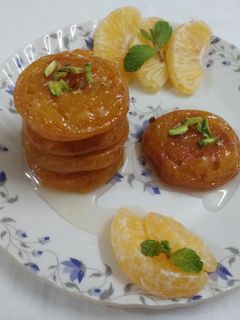 संत्र्याचा मालपुआ (orange malpua recipe in marathi) रेसिपी चे मुख्य फोटो