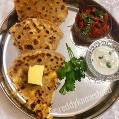 A picture of Whole wheat Paneer stuffed Parathas.