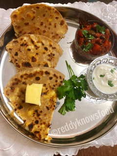 A picture of Whole wheat Paneer stuffed Parathas.