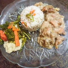 A picture of Chicken Stroganoff,Mashed Potatoes, Sautéed Veggies served with Herb Rice Platter.