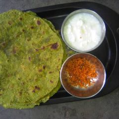 A picture of Methi Paratha With Ground Chutney & Butter Milk.