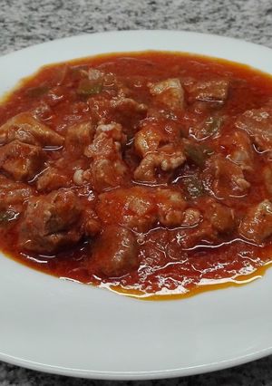 Una foto de Magro de cerdo con tomate