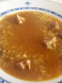 Una foto de Arroz caldoso con pollo