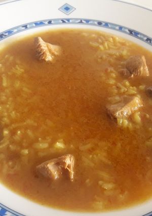 Una foto de Arroz caldoso con pollo