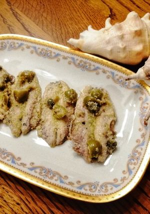 Foto di Alici capperi e olive