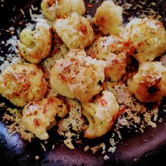 A picture of Roasted Cauliflower with Cheese And Herb.