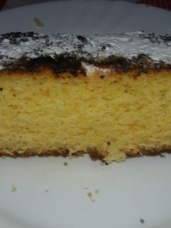 Una foto de Bizcocho con zumo de naranja