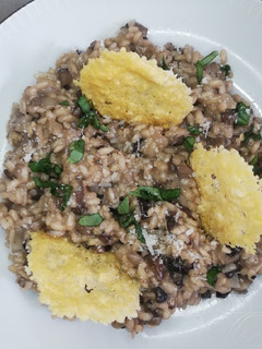 Una foto de Risotto de setas varias y parmesano