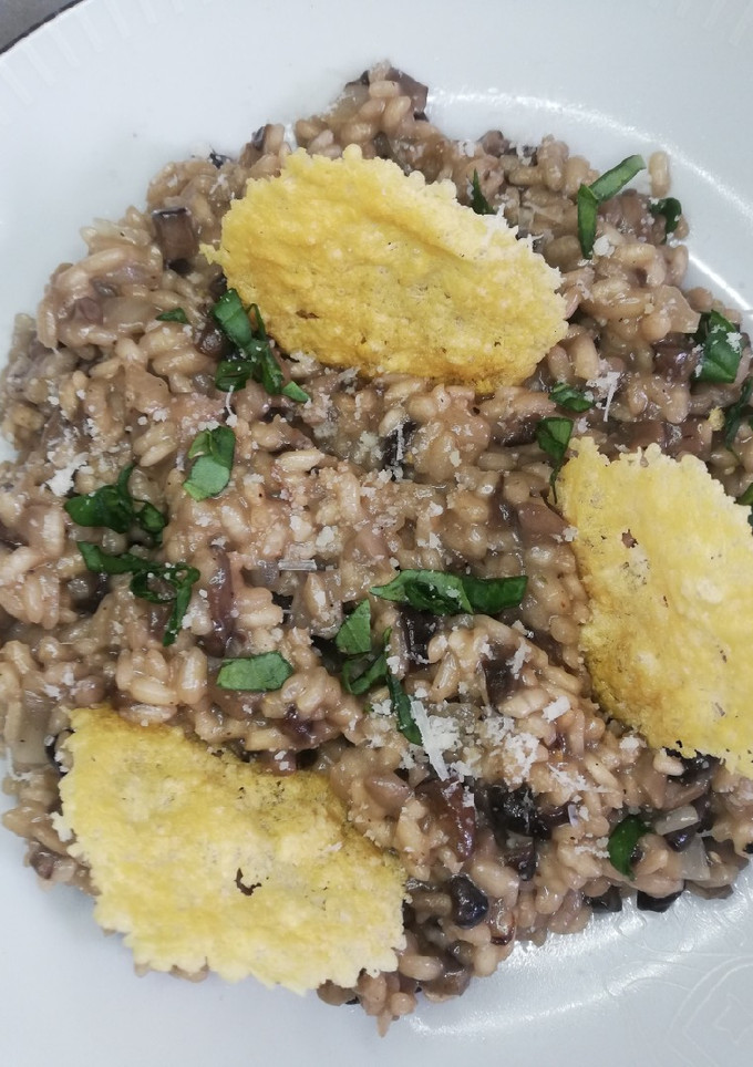 Una foto de Risotto de setas varias y parmesano