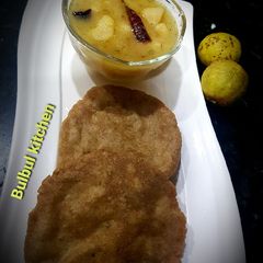 Singhara puri with khatte sabzi A picture of Singhara puri with khatte sabzi.