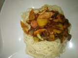 Sausage and chicken sauce with spaghetti