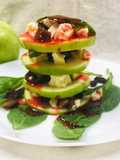 Green Apple Salad with cheese dry fruits and strawberry sauce