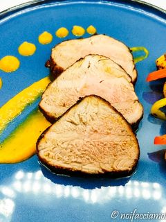 A picture of Oven-Baked Spiced Pork Tenderloin with Peppers.