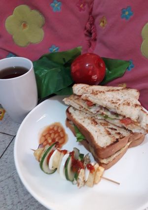 A picture of Toasted bread with fried potatoes n egg stick.