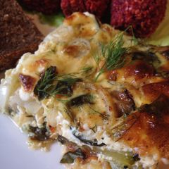 A picture of Zucchini Flan with Fresh Basil.